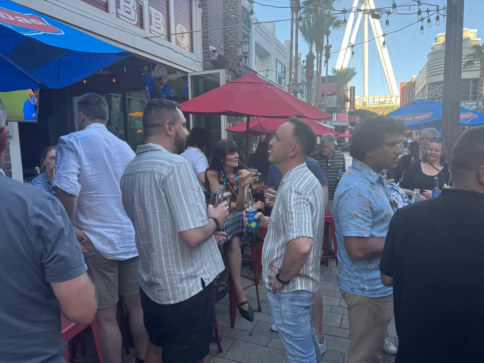Mingling on the patio with the High Roller behind